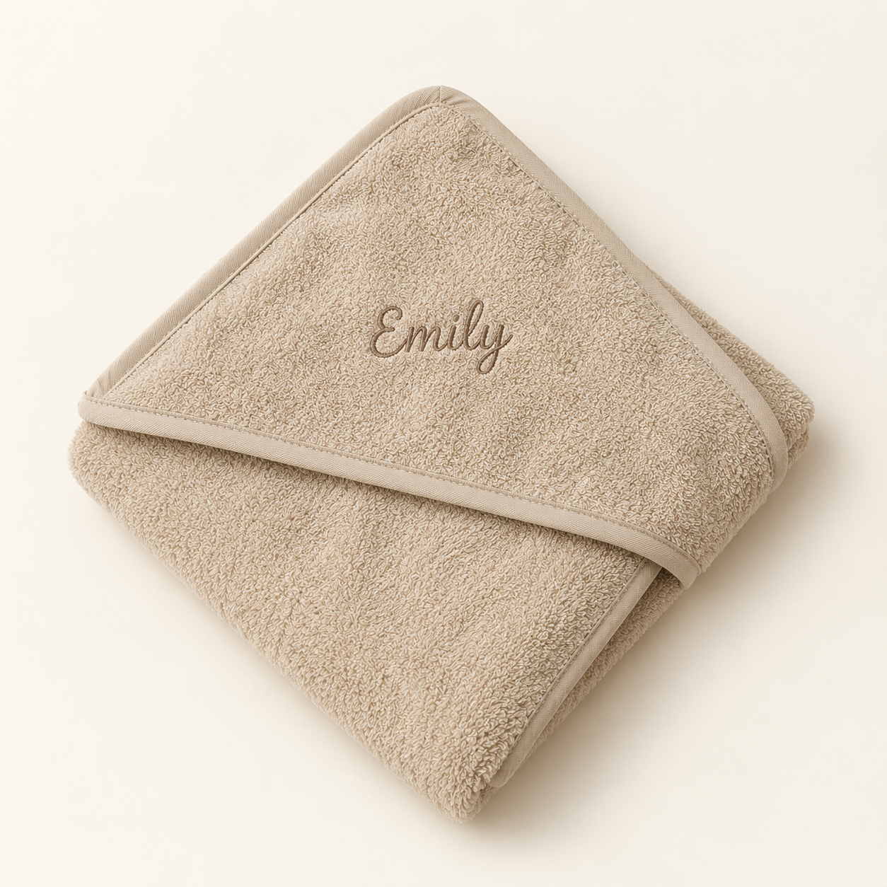 Illustrative sand-coloured hooded towel embroidered Emily